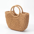 Handmade beige half-moon woven straw tote bag