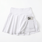 White high-waisted pleated tennis skirt with built-in shorts
