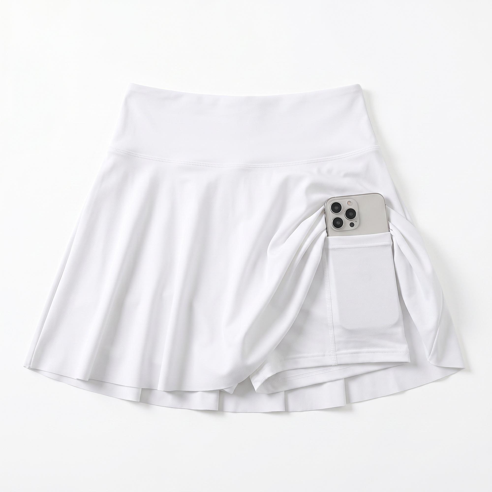 White high-waisted pleated tennis skirt with built-in shorts